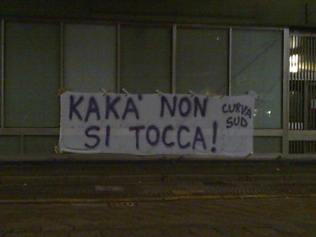 A banner by AC Milan Ultras for Kaka' reads "Don't touch Kaka'"